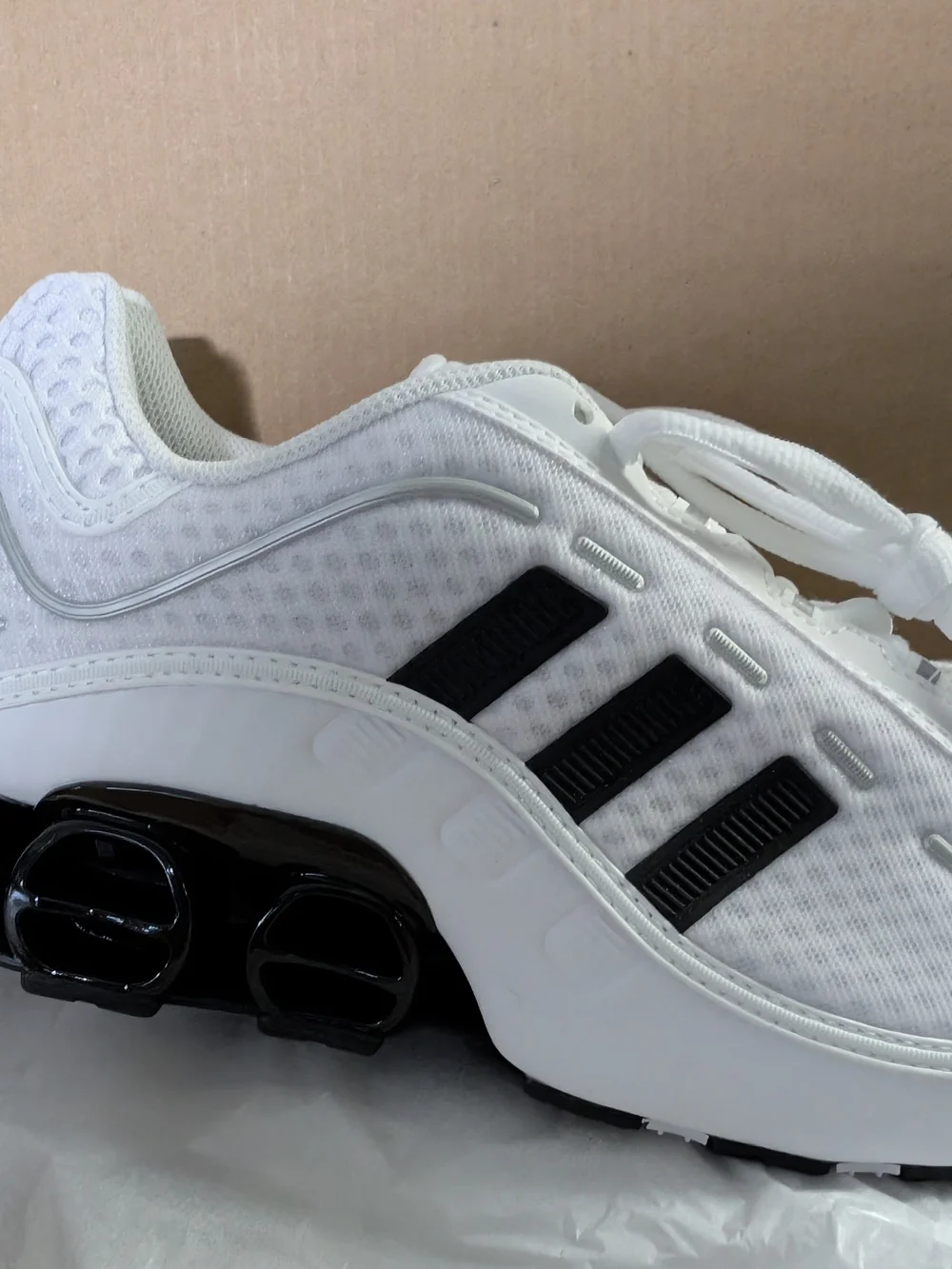 Adidas White Athletic Sneakers with Black Stripes